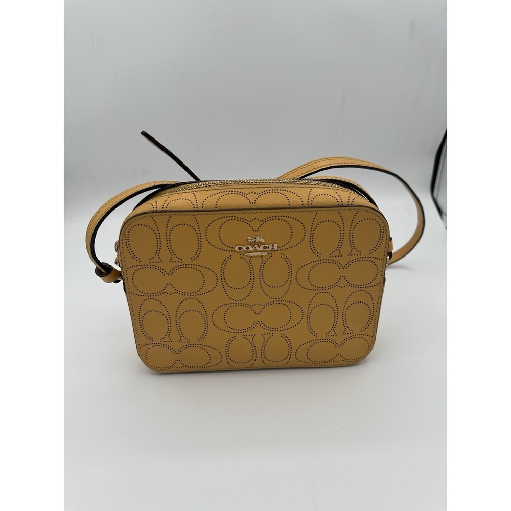 Coach Perforated Signature Mini Crossbody in Mustard